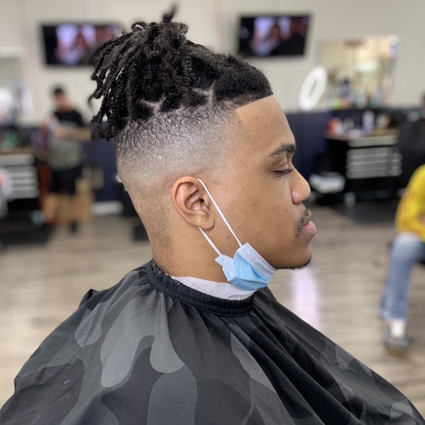 Fresh fade and sharp line up with twists by Pedro